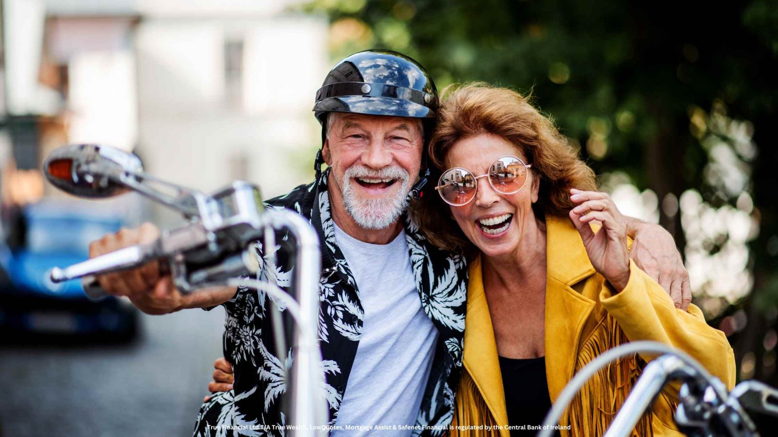 old couple riding a motorbike