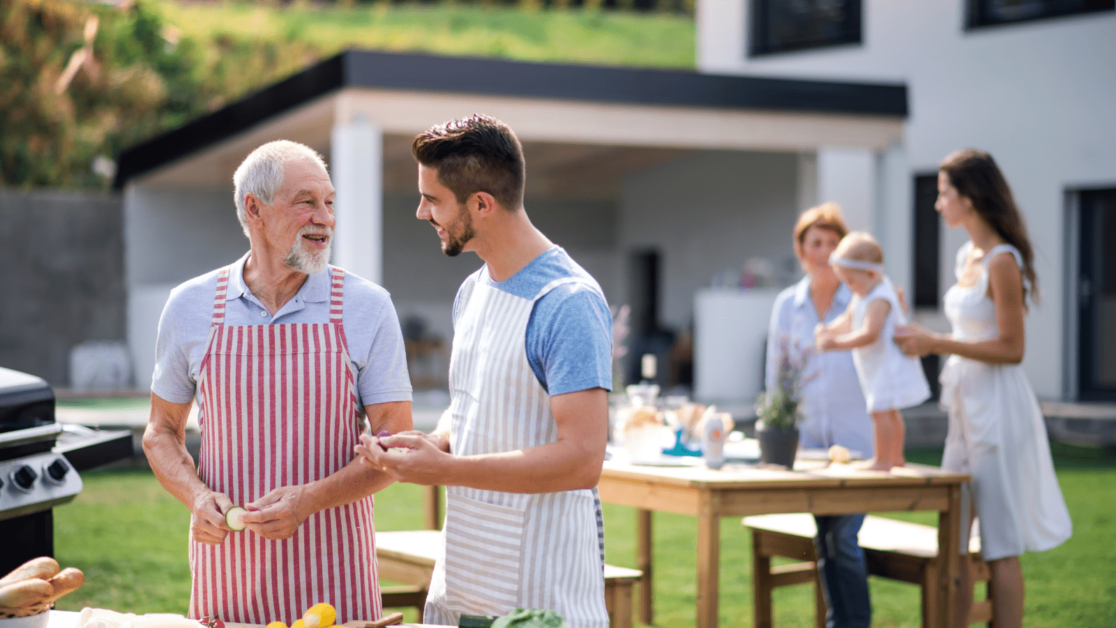 father with adult son barbecue