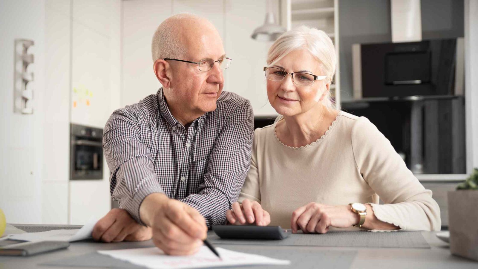 old couple discussing finances